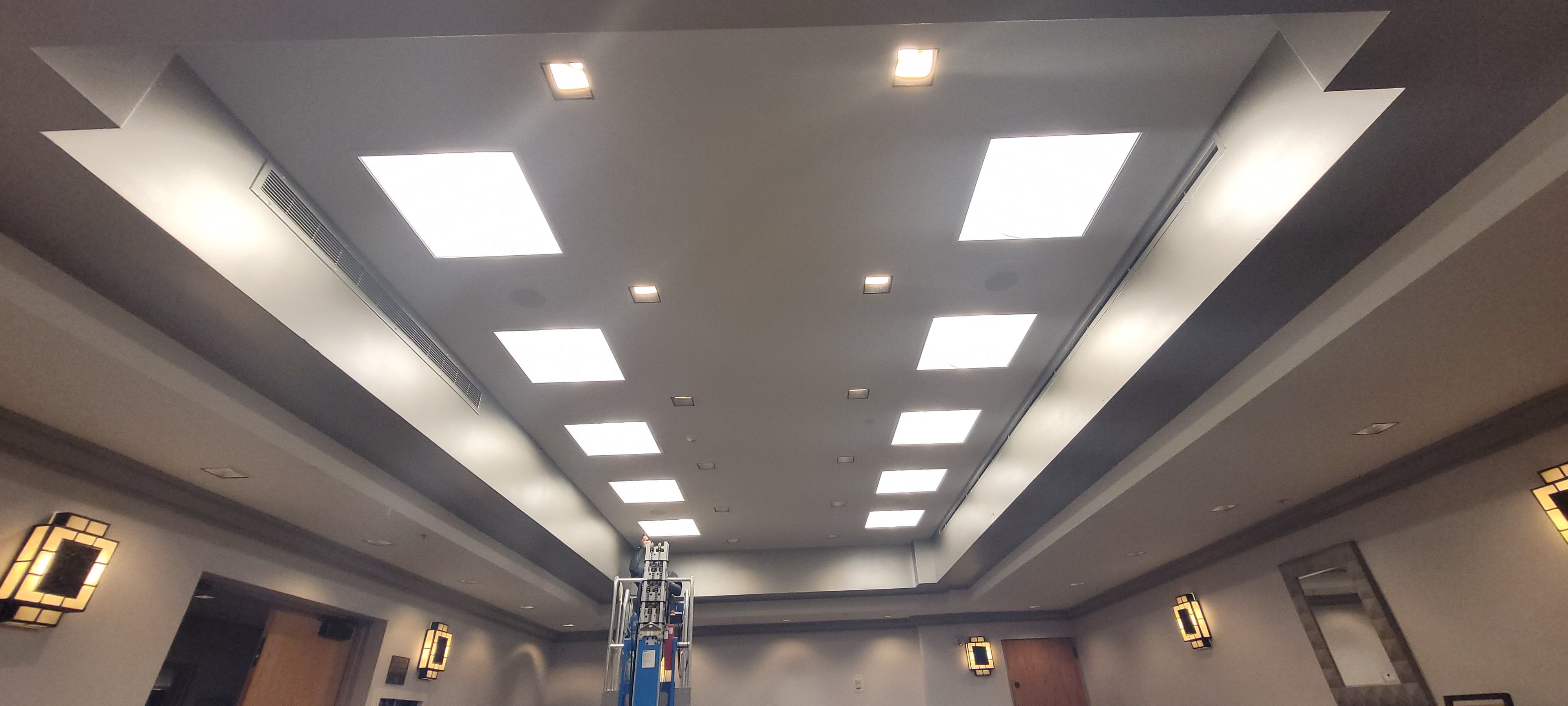 Professional LED ceiling installation and electrical work in commercial building